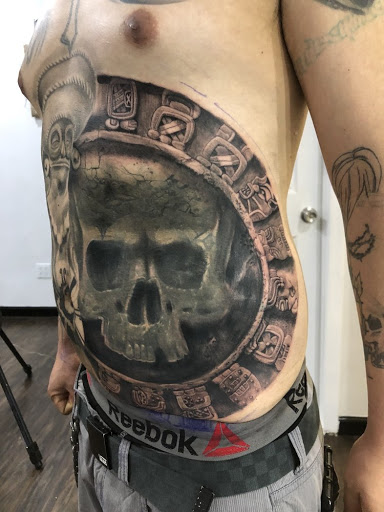 Find buck tattoo ideas for your next unique tattoo in Astoria at Xolotl Tattoo Gallery