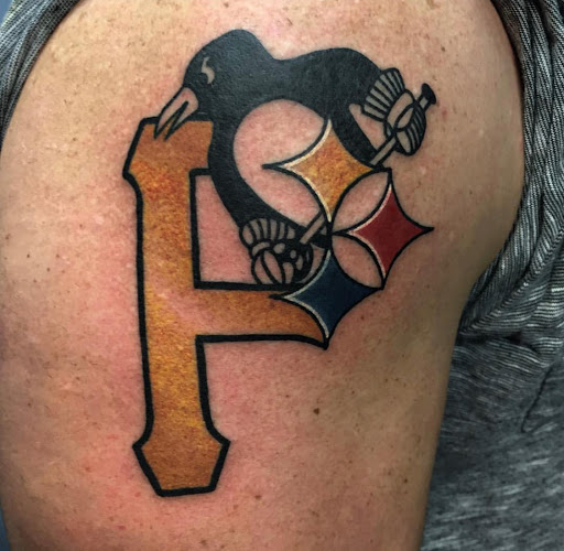 Explore tattoo ideas for behind ear, creative tattoo ideas in Pittsburgh, available at Pittsburgh Tattoo Company
