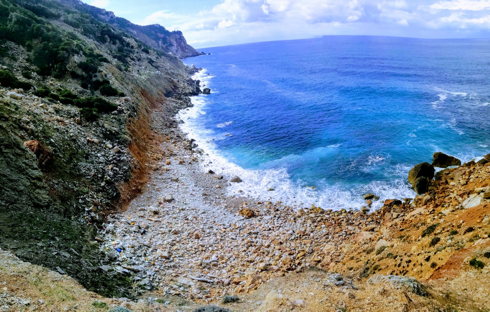 Foto von Spiaggia di San Lorenzo mit felsiges gelände Oberfläche
