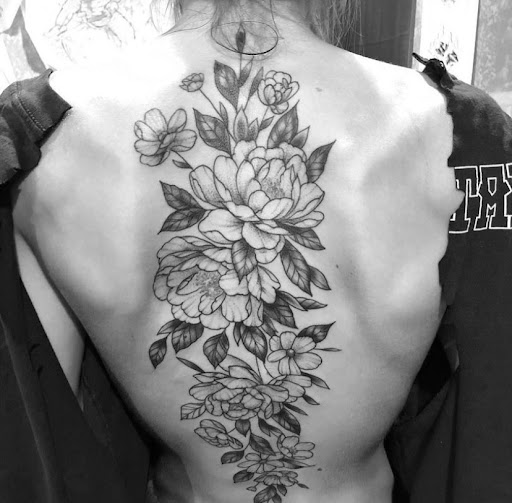 Explore comic book tattoo ideas, creative tattoo ideas in Ridge, available at Masquerade Tattoo Shop