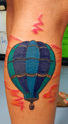 Explore lower back cover up tattoo ideas, creative tattoo ideas in Meridian, available at SK-Tattoo1