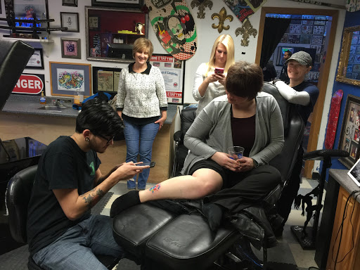 Explore thigh flower tattoo ideas, creative tattoo ideas in Rockford, available at Euro Tattoo