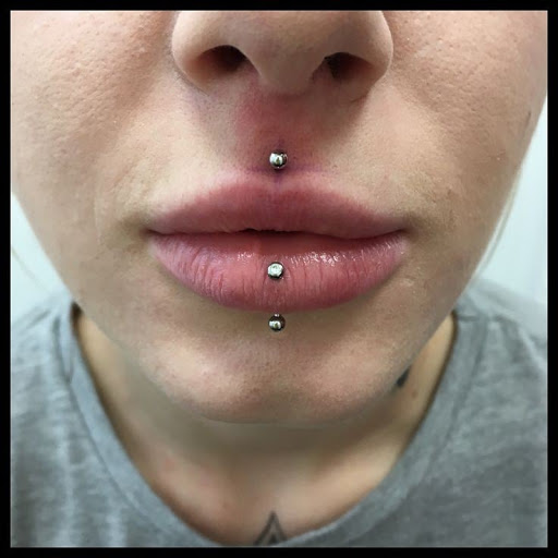 Explore letter t tattoo ideas, creative tattoo ideas in Elko, available at Custom Tattoos and Body Piercing Studio