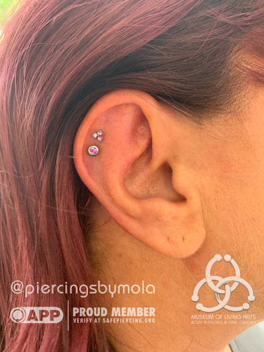 Explore stitching tattoo ideas, creative tattoo ideas in Charleston, available at MOLA Piercing and Fine Jewelry