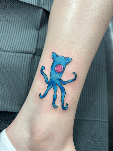 Explore ankle flower tattoo ideas, creative tattoo ideas in Plattsmouth, available at Stabbed Ink