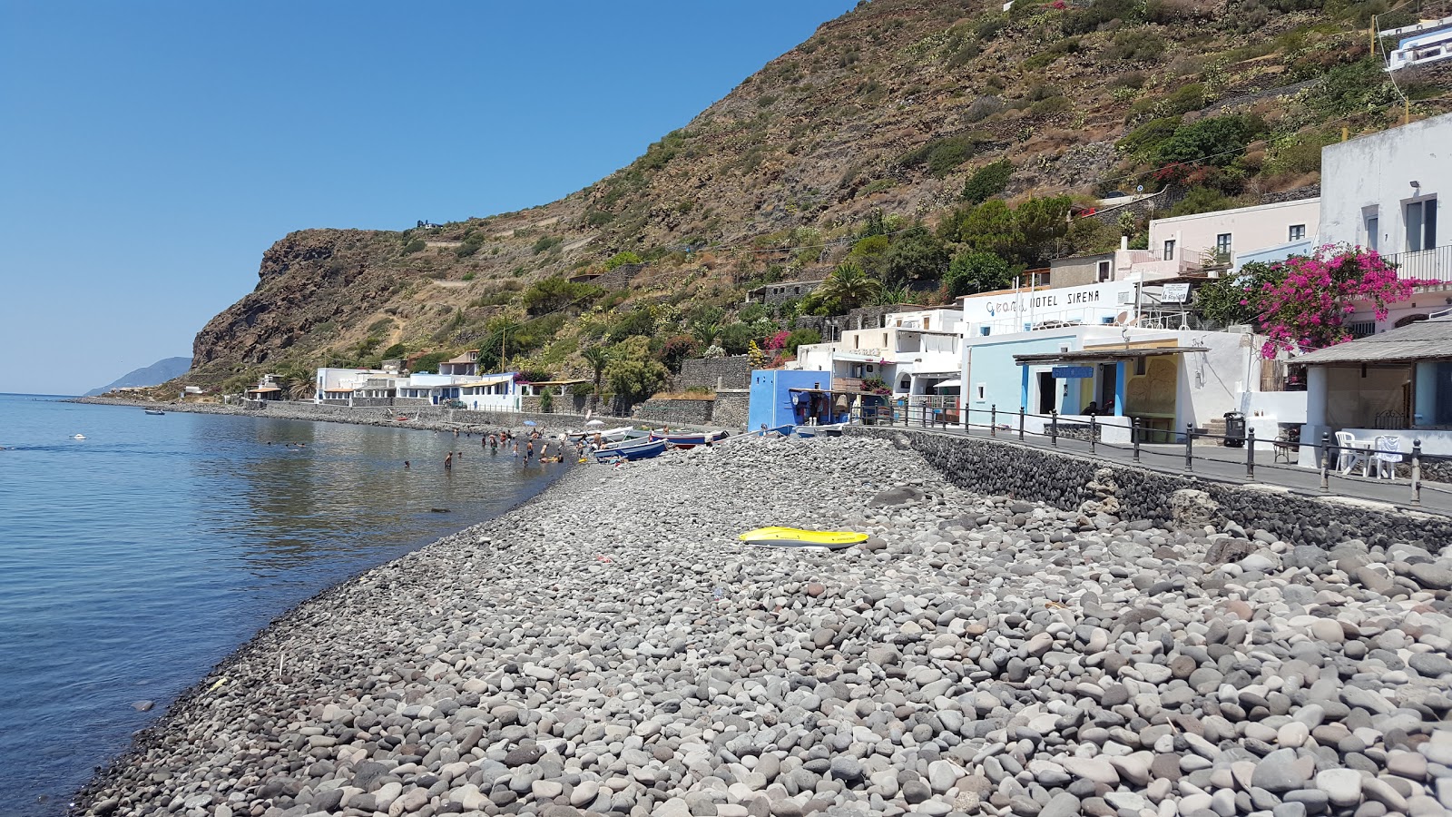 Valokuva Spiaggia di Pecorini a Mareista. pinnalla kevyt kivi:n kanssa