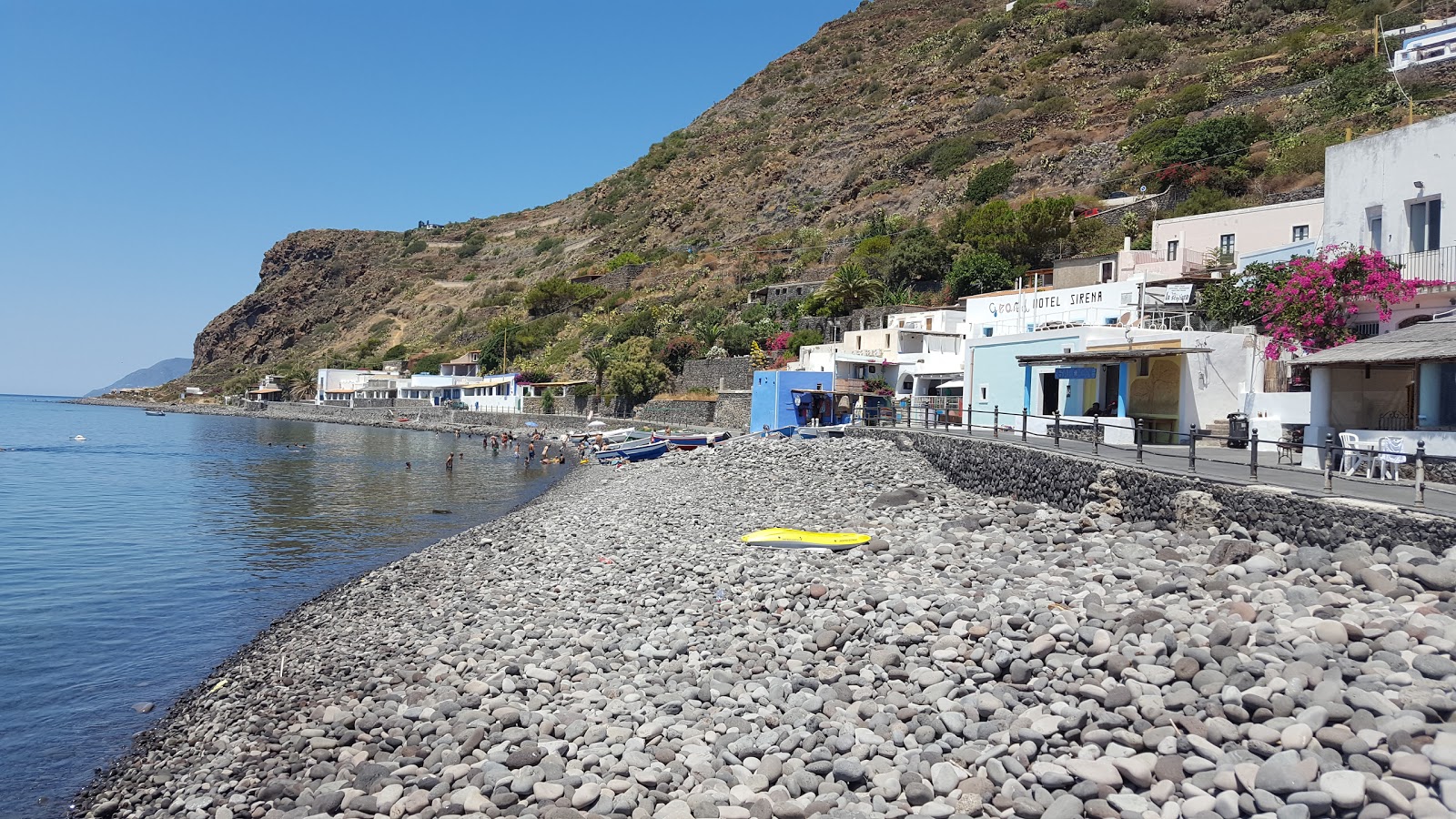 Fotografie cu Pecorini a Mare Beach cu o suprafață de pietricel cenușiu