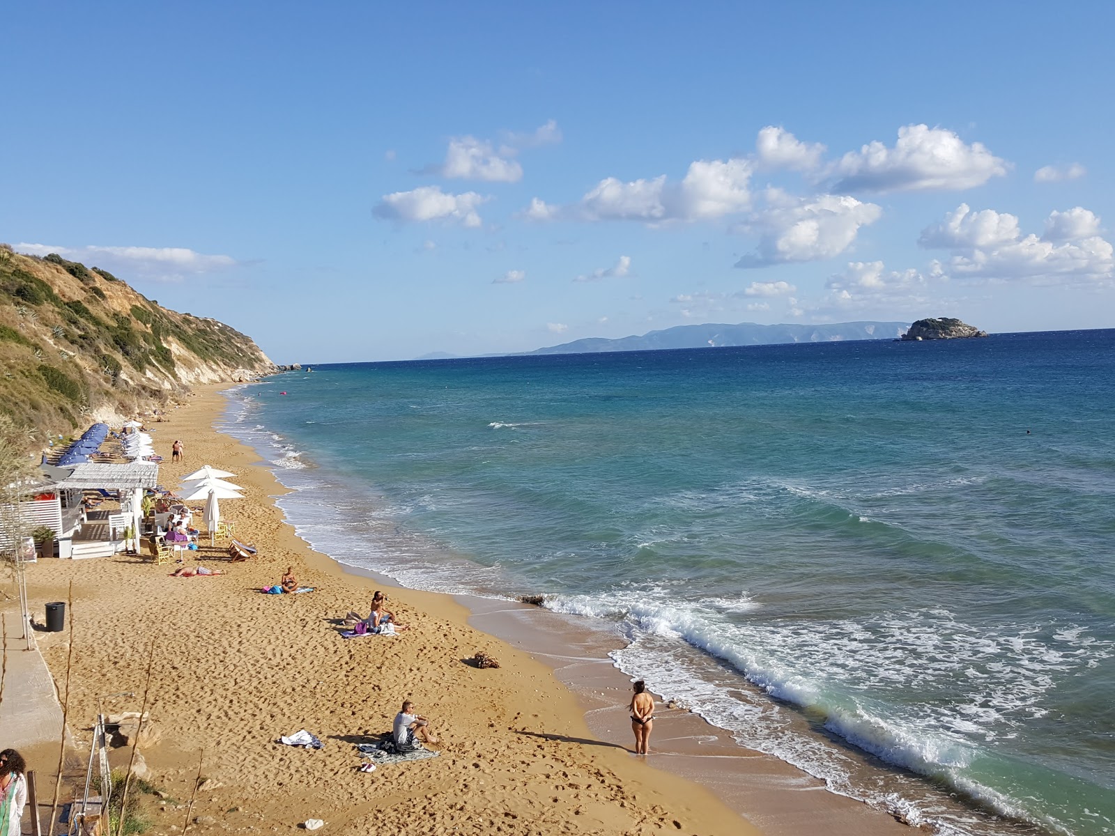 Photo of Avithos beach backed by cliffs