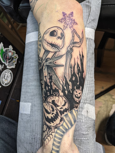 Explore kissing lips tattoo ideas, creative tattoo ideas in Erie, available at Wayward Tattoo Studio