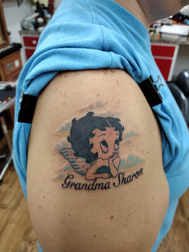 Explore jesus christ tattoo ideas, creative tattoo ideas in Park Hills, available at Sideshow Tattoo and Piercings