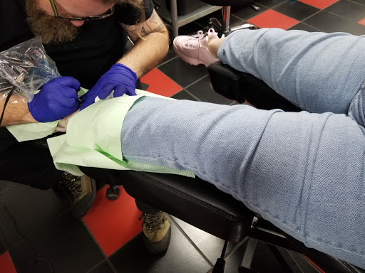 Tattoo Shop «Atomic Tattoos and Piercing», reviews and photos, 2850 Curry Ford Rd, Orlando, FL 32806, USA