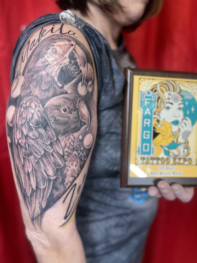 Explore tattoo sleeve skull ideas, creative tattoo ideas in Watford City, available at Soulful Ink Studios