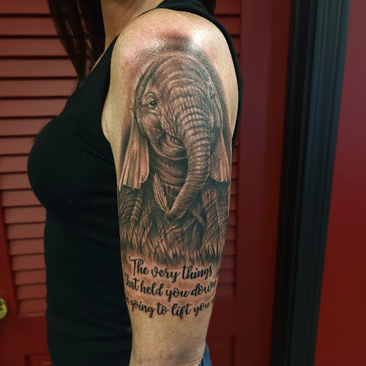 Explore women's hand tattoo ideas, creative tattoo ideas in Brunswick, available at Black Element Tattoo