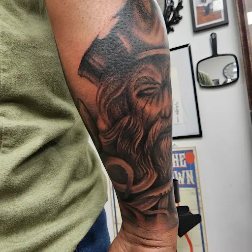 Explore tattoo ideas for women's lower back, creative tattoo ideas in Fredericksburg, available at Tattoo Haven