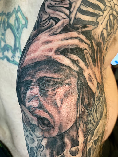 Explore mens tattoos ideas small, creative tattoo ideas in Pikeville, available at The Carbon Canary Tattoo Studio