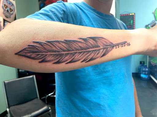 Explore small elephant tattoo ideas, creative tattoo ideas in Meridian, available at Creative Pain Tattoo Studio