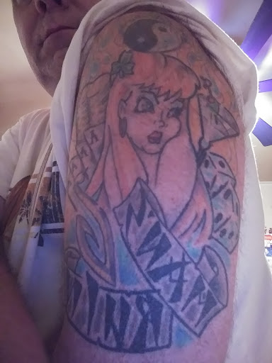 Explore saint michael tattoo ideas, creative tattoo ideas in Gainesville, available at The Hive Body Art Collective