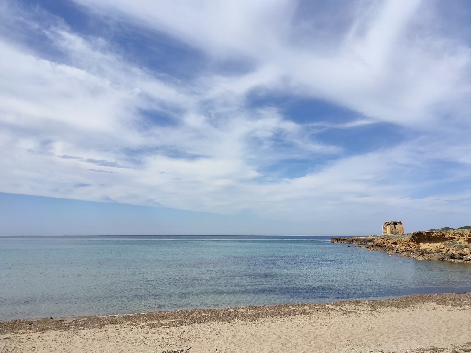 Foto af Torre Testa med lys sand overflade