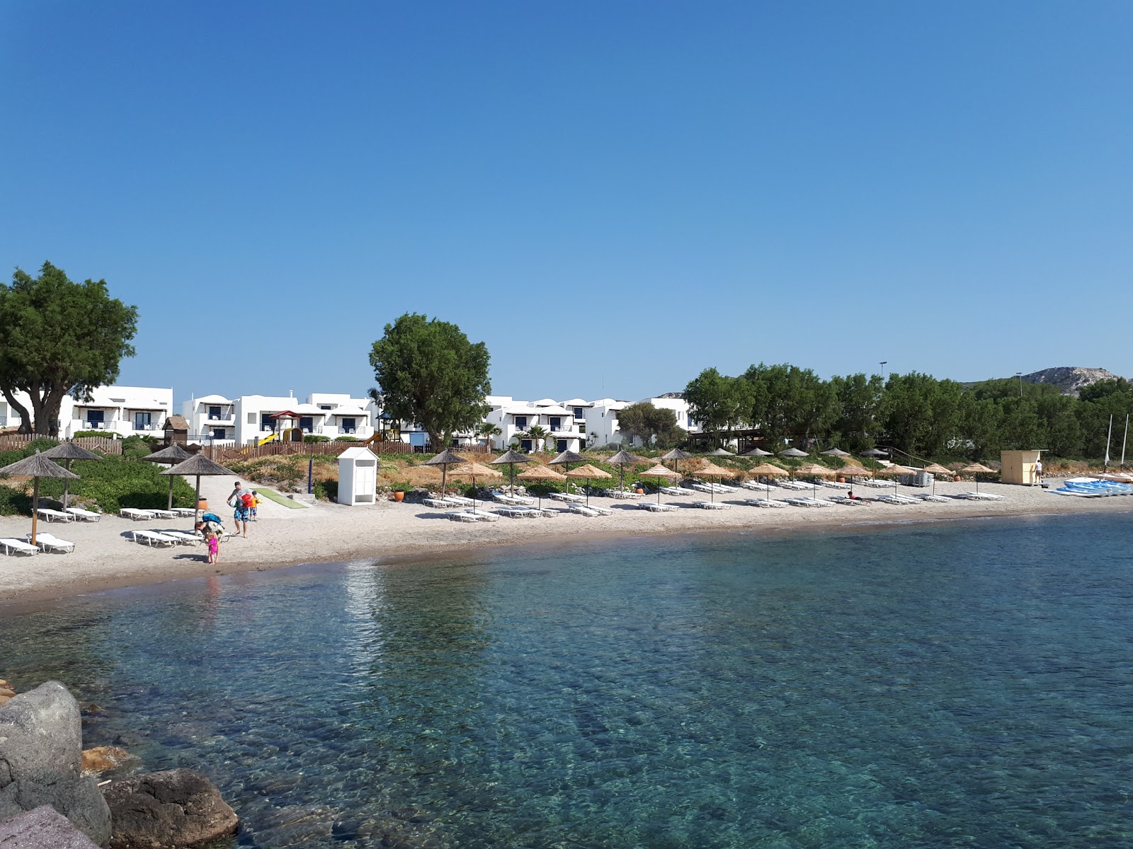 Photo of Helona beach with turquoise pure water surface