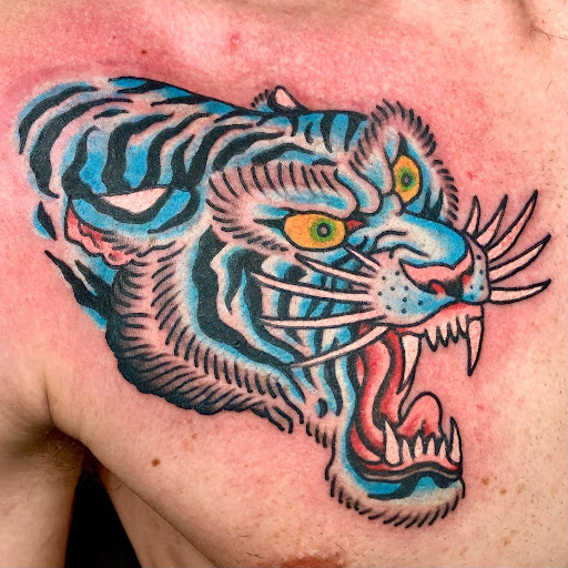 Explore kiss band tattoo ideas, creative tattoo ideas in Nashua, available at Sundance Tattoo Parlor