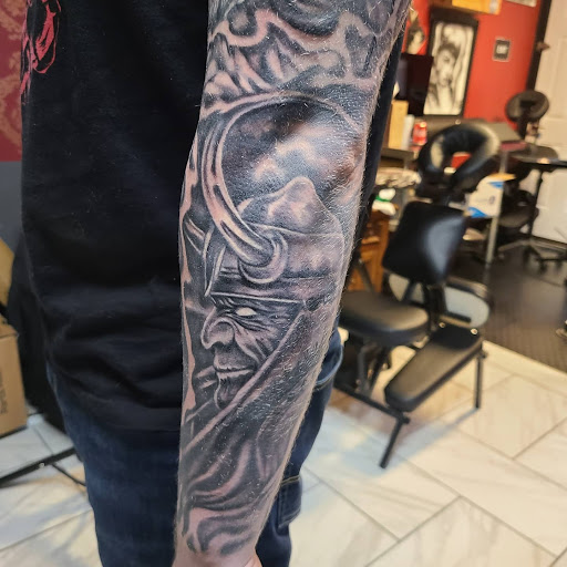 Explore tattoos cover up ideas, creative tattoo ideas in Northampton, available at Inkglorious Custom Tattoo Studio