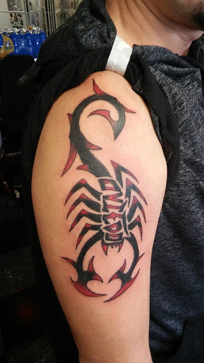 Explore green tattoo ideas, creative tattoo ideas in Big Spring, available at A Mom & Pop Tattoo Shop