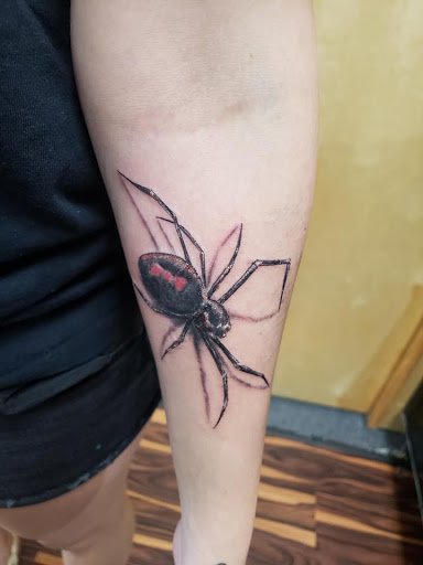 Explore bold tattoo ideas, creative tattoo ideas in Flint, available at Black Eye Social Club Tattoo