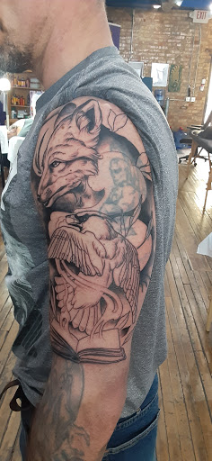 Tattoo Shop «Eclectic Art Tattoo Gallery», reviews and photos, 615 E Michigan Ave, Lansing, MI 48912, USA