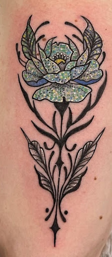 Explore dirtbike tattoo idea, creative tattoo ideas in Mesa, available at Ranger Tattoo & Piercing