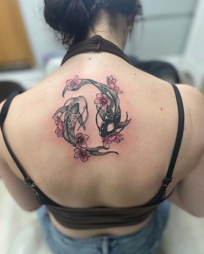 Explore rose tattoo cover up ideas, creative tattoo ideas in Milwaukee, available at The Skin Museum