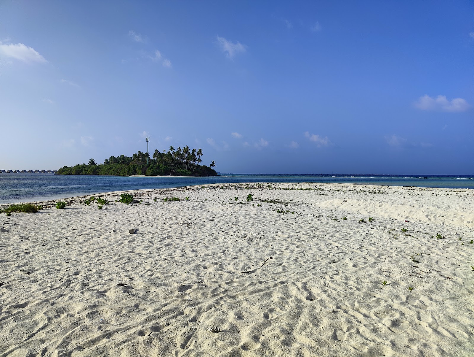 Foto di Maamendhoo Beach con una superficie del sabbia beige