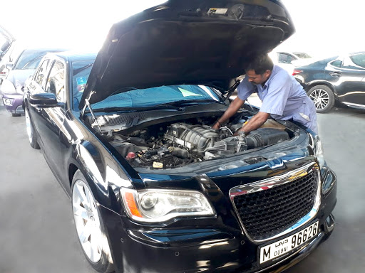 Al Mansoori Garage | Auto Repair Workshop | Auto Painting - Denting - Body work - AC fixing - Quick oil Change - Engine Tune up - Car Mechanical Services
