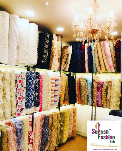 Suresh Fashion Hub Pvt.Ltd :-Trims Laces Latkans Patches & Fabric Showroom