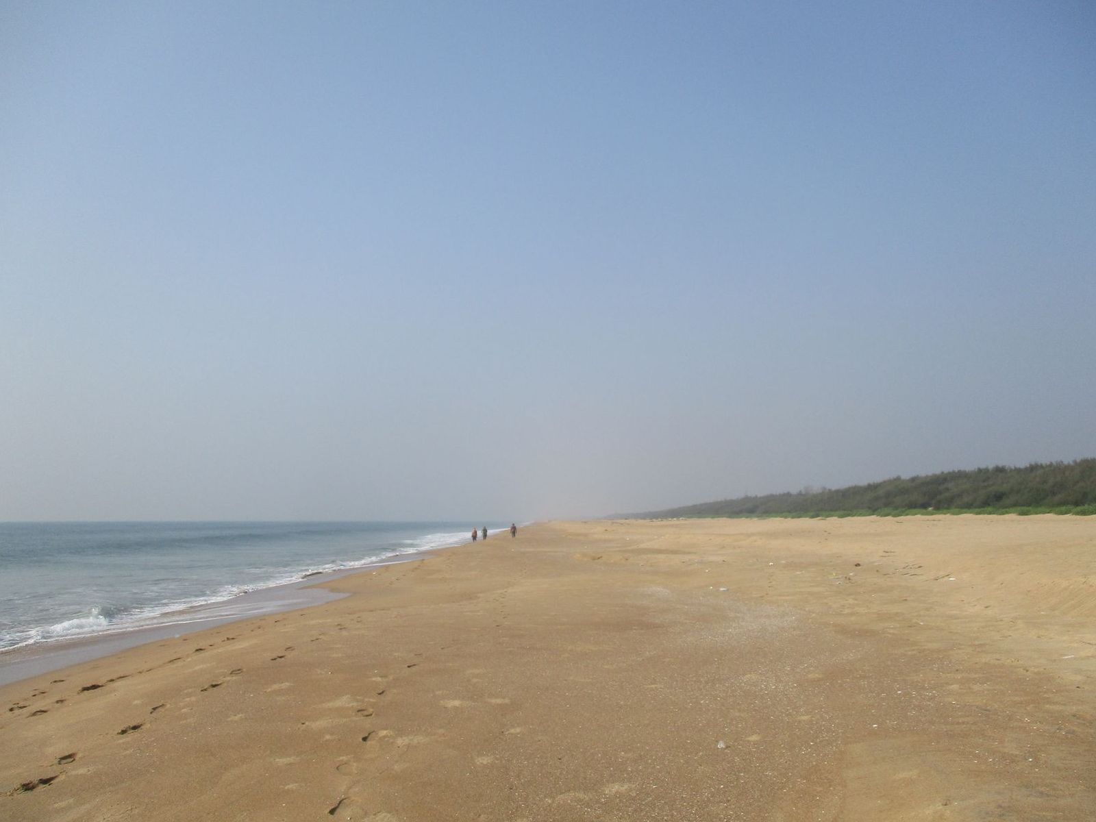 Foto van Naba Beach met helder zand oppervlakte