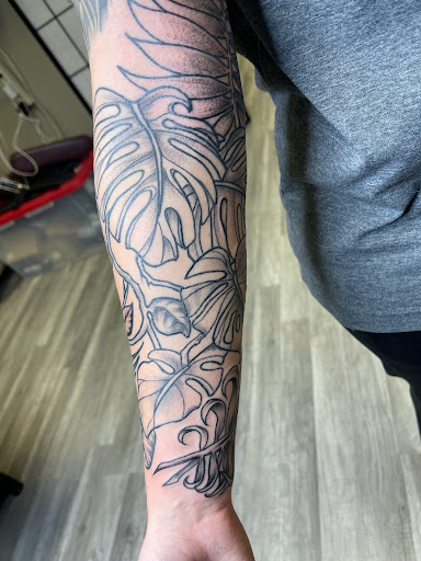 Explore tattoo name cover up ideas on wrist, creative tattoo ideas in Watford City, available at Soulful Ink Studios