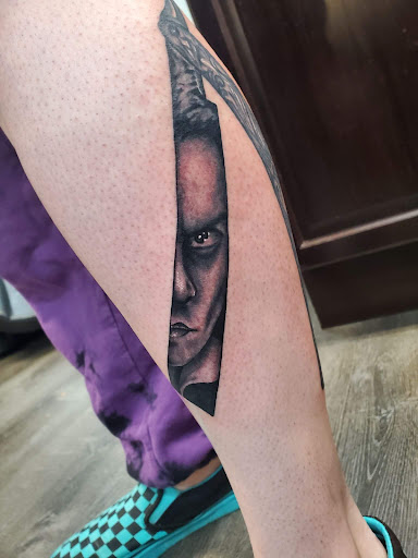 Explore dragon tattoo cover up ideas, creative tattoo ideas in Westland, available at Premier Tattoo Company Westland