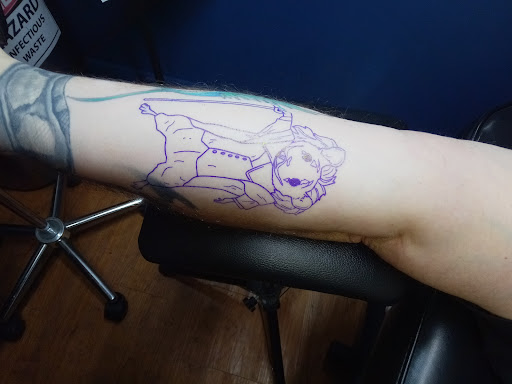 Explore mma tattoos ideas, creative tattoo ideas in Williamston, available at Inkd Tattoo Parlor