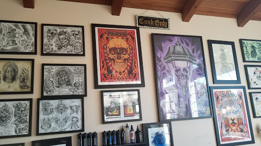 Find king crown tattoo ideas for your next unique tattoo in San Jose at Blue Rose Tattoo