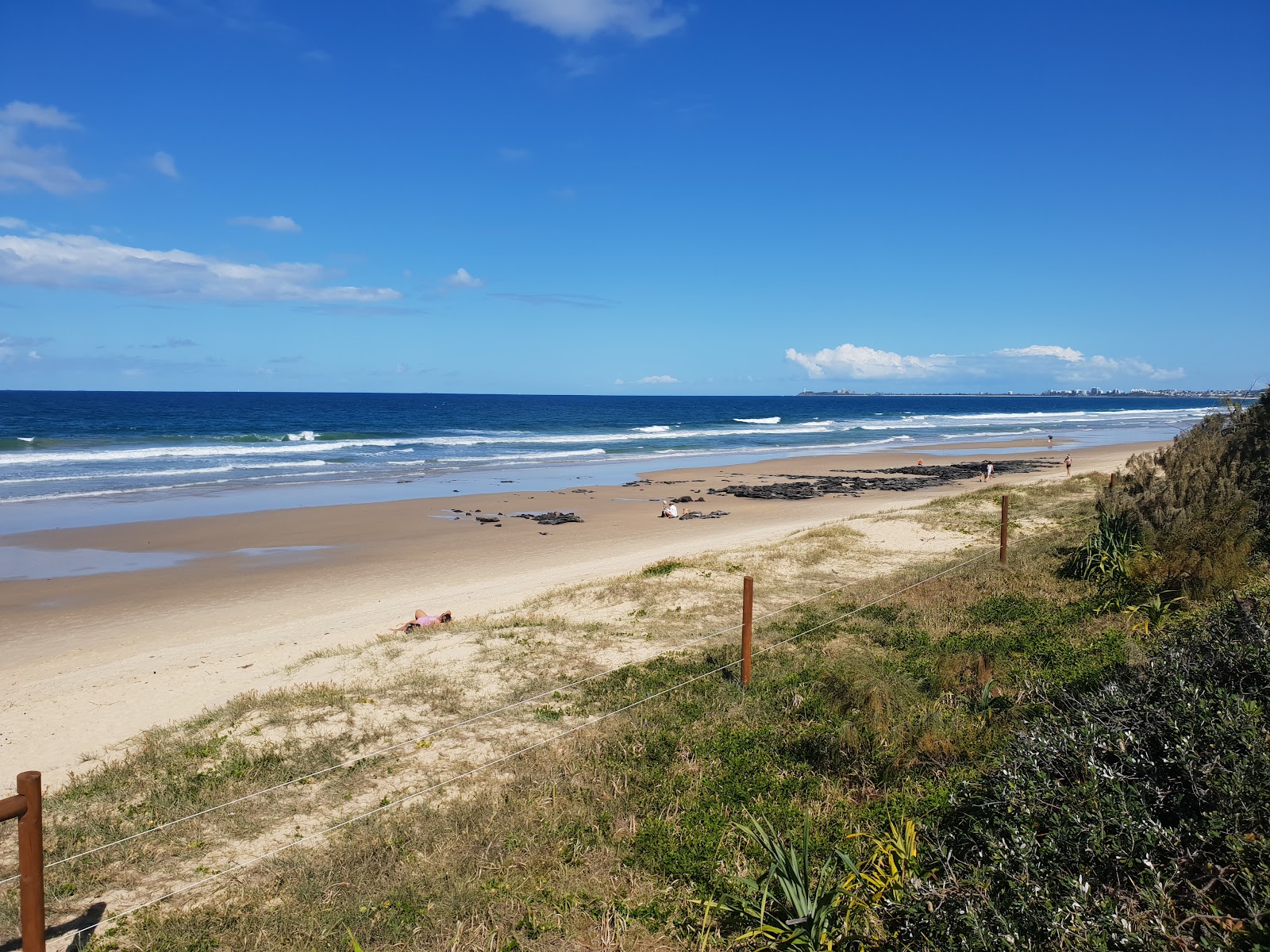 Fotografija Mudjimba Beach z dolga ravna obala