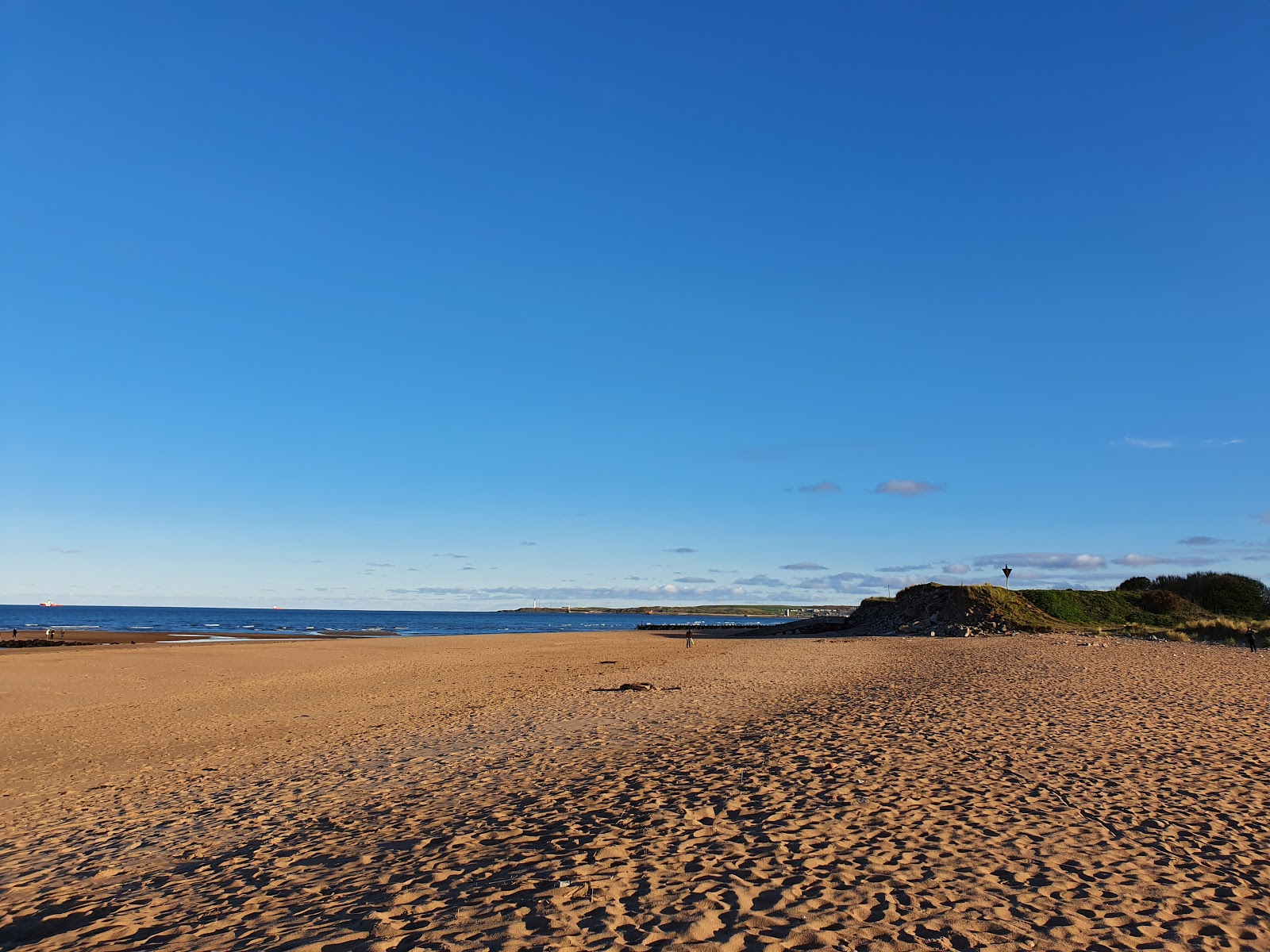 North Donmouth Beach的照片 带有碧绿色纯水表面