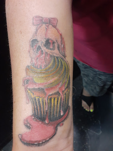 Explore cat tattoo idea, creative tattoo ideas in Hamilton, available at A New Part of You Tattoos and Piercings