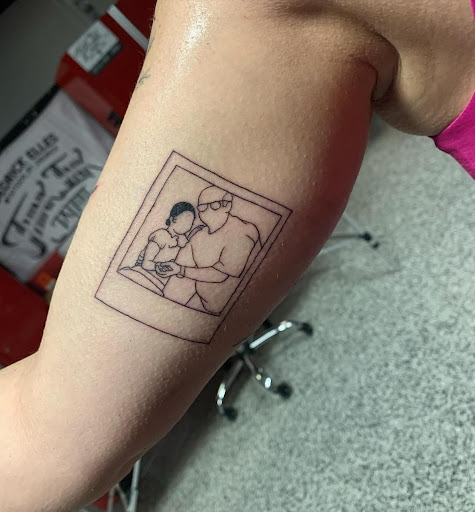 Explore kiss band tattoo ideas, creative tattoo ideas in Fenton, available at Think Ink Tattoo Co