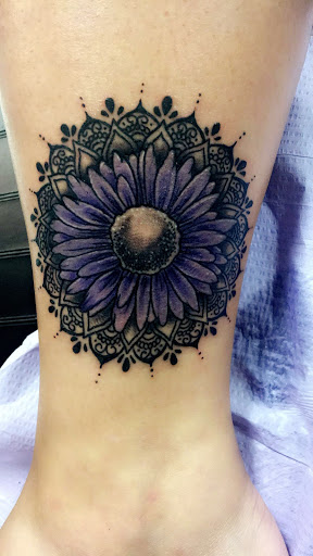 Explore small neck tattoo ideas, creative tattoo ideas in Tifton, available at Embody Art Tattoo Studio