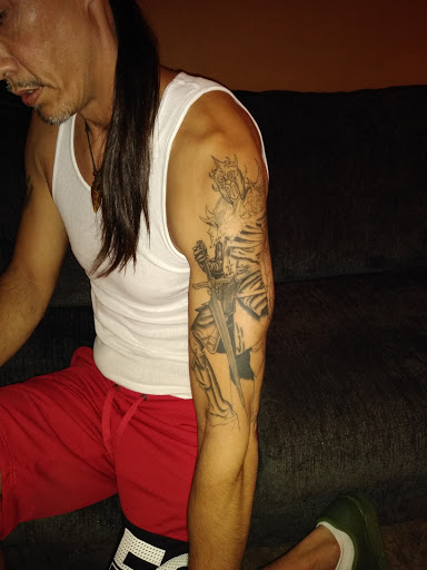 Explore harmonica tattoo ideas, creative tattoo ideas in Cincinnati, available at Luminous Fine Jewelry and Piercing