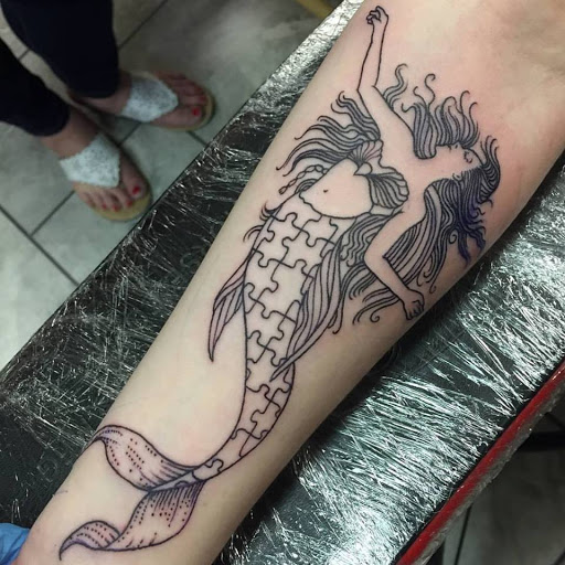 Explore the beatles tattoo ideas, creative tattoo ideas in Palmyra, available at Muse Tattoo & Body Piercing