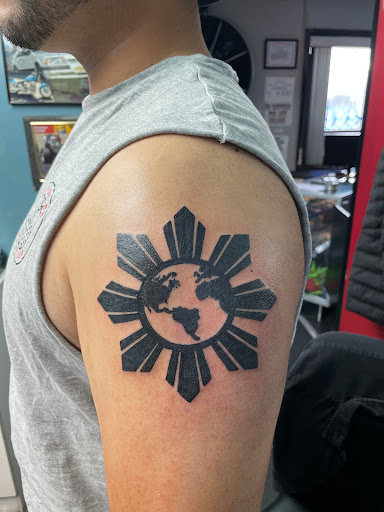 Explore map tattoo ideas, creative tattoo ideas in Bloomfield, available at Tattoo Garage