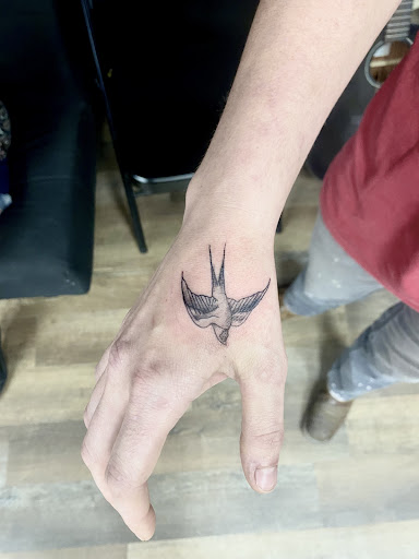 Explore tattoo filler ideas for guys, creative tattoo ideas in Lake City, available at Crooked Spines Tattoo Studio