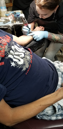 Explore saturn tattoo ideas, creative tattoo ideas in Englewood, available at White Eagle Tattoo