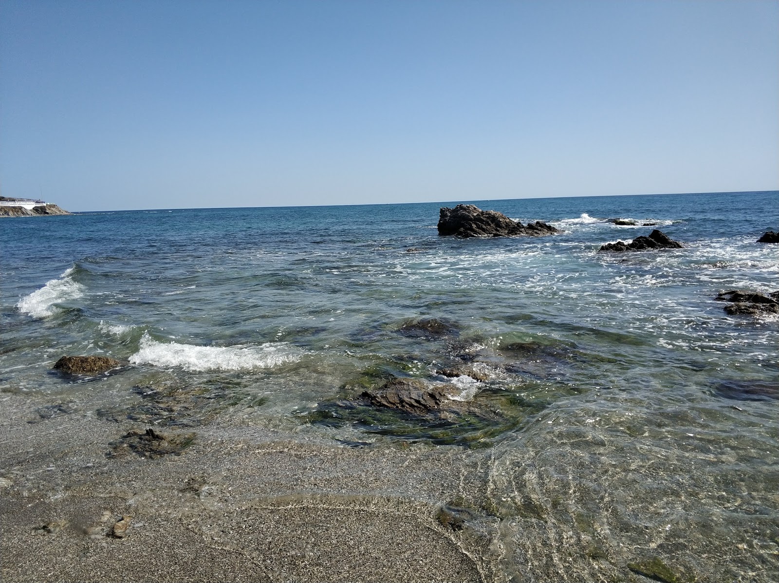 Foto di Playa del Charcon con baia piccola