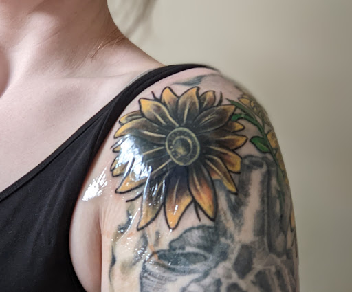 Explore mens spine tattoo ideas, creative tattoo ideas in Omaha, available at Inkfu Tattoo Studio